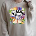 Unearth A Story Reading Book Summer Book Lover Raglan Sleeve Sweatshirt Heather Forest