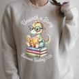 Unearth A Story Summer Reading 2026 Cute Dino Book Lover Raglan Sleeve Sweatshirt Heather Forest Unearth A Story Summer Reading 2026 Cute Dino Book Lover Raglan Sleeve Sweatshirt Heather Forest