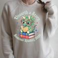 Unearth a Story Summer Reading 2026 Cute Dinosaur Book Lover Raglan Sleeve Sweatshirt Heather Forest