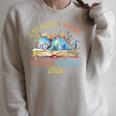 Unearth a Story Summer Reading 2026 Dinosaur Books Dino Raglan Sleeve Sweatshirt Heather Forest Unearth a Story Summer Reading 2026 Dinosaur Books Dino Raglan Sleeve Sweatshirt Heather Forest