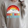 Unearth a Story Summer Reading 2026 Vintage Book Rainbow Raglan Sleeve Sweatshirt Heather Forest Unearth a Story Summer Reading 2026 Vintage Book Rainbow Raglan Sleeve Sweatshirt Heather Forest