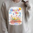 Unearth a Story Summer Reading 2026 Wildflower Book Library Raglan Sleeve Sweatshirt Heather Forest Unearth a Story Summer Reading 2026 Wildflower Book Library Raglan Sleeve Sweatshirt Heather Forest