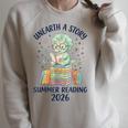 Unearth a Story Triceratops Dinosaur Reading Books Cute Dino Raglan Sleeve Sweatshirt Heather Forest Unearth a Story Triceratops Dinosaur Reading Books Cute Dino Raglan Sleeve Sweatshirt Heather Forest