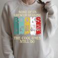Some Of Us Grew Up Reading Books The Cool Ones Still Do Raglan Sleeve Sweatshirt Heather Forest
