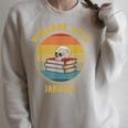 Vintage January 1972 Dark Academia Skull On Books Distressed Raglan Sleeve Sweatshirt Heather Forest Vintage January 1972 Dark Academia Skull On Books Distressed Raglan Sleeve Sweatshirt Heather Forest