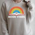 Vintage Retro Book Vibes Rainbow For Reading Lovers Raglan Sleeve Sweatshirt Heather Forest