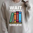 Wait Let Me Take A Shelfie Bookworm Book Pun Nerd Raglan Sleeve Sweatshirt Heather Forest