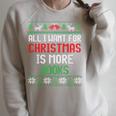 All I Want Is More Books & Reading Lover Ugly Christmas Raglan Sleeve Sweatshirt Heather Forest