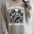 Weird Teachers Build Character Skeleton Reading Book Raglan Sleeve Sweatshirt Heather Forest