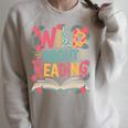Wild About Reading Book Reading Library Writer Premium Tri-Blend Raglan Sleeve Sweatshirt Heather Forest
