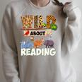 Wild About Reading Book Lover Bookworm Library Day Raglan Sleeve Sweatshirt Heather Forest