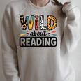 Wild About Reading Reading Books And Bookworm Library Day Raglan Sleeve Sweatshirt Heather Forest