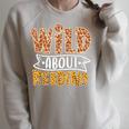 Wild About Reading Books Lovers Library Day English Teacher Men Women Raglan Sleeve Sweatshirt Heather Forest