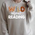 Wild About Reading Teacher Reading Books Back To School Raglan Sleeve Sweatshirt Heather Forest Wild About Reading Teacher Reading Books Back To School Raglan Sleeve Sweatshirt Heather Forest