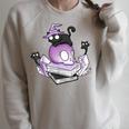 Witch Ghost Cat Skull Magic Books Raglan Sleeve Sweatshirt Heather Forest