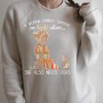 A Woman Cannot Survive On Books Alone She Also Needs Dogs Raglan Sleeve Sweatshirt Heather Forest