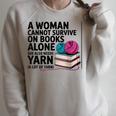 A Woman Cannot Survive On Books Alone She Also Needs Yarn Raglan Sleeve Sweatshirt Heather Forest A Woman Cannot Survive On Books Alone She Also Needs Yarn Raglan Sleeve Sweatshirt Heather Forest