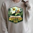 Women's 2026 Summer Reading Unearth a Story Teachers Students Book Raglan Sleeve Sweatshirt Heather Forest Women's 2026 Summer Reading Unearth a Story Teachers Students Book Raglan Sleeve Sweatshirt Heather Forest