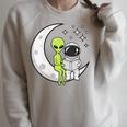 Women's Alien And Astronaut Reading On Moon Kids Sci Fi Book Raglan Sleeve Sweatshirt Heather Forest Women's Alien And Astronaut Reading On Moon Kids Sci Fi Book Raglan Sleeve Sweatshirt Heather Forest