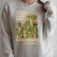 Women's Book & Plant Lover Reading Gardening She Also Need Plants Raglan Sleeve Sweatshirt Heather Forest Women's Book & Plant Lover Reading Gardening She Also Need Plants Raglan Sleeve Sweatshirt Heather Forest