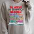 Women's Book Lover 10 Ways To Become a Reader Quote Raglan Sleeve Sweatshirt Heather Forest Women's Book Lover 10 Ways To Become a Reader Quote Raglan Sleeve Sweatshirt Heather Forest
