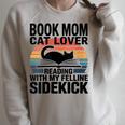 Women's Book Mom Cat Lover Reading With My Felline Sidekick Raglan Sleeve Sweatshirt Heather Forest