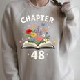 Women's Chapter 48 Years Old 48th Birthday Celebration Floral Book Raglan Sleeve Sweatshirt Heather Forest