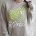 Women's Distracted By Books And Dogs Reader Graphic Raglan Sleeve Sweatshirt Heather Forest Women's Distracted By Books And Dogs Reader Graphic Raglan Sleeve Sweatshirt Heather Forest