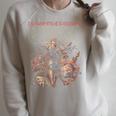 Women's Dungeon Crawler Carl The Inevitable Ruin Cover LitRPG Book Raglan Sleeve Sweatshirt Heather Forest Women's Dungeon Crawler Carl The Inevitable Ruin Cover LitRPG Book Raglan Sleeve Sweatshirt Heather Forest