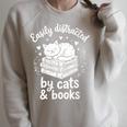 Women's Easily Distracted By Cats And Books Raglan Sleeve Sweatshirt Heather Forest