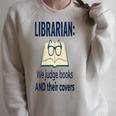 Women's We Judge Books And Their Covers Raglan Sleeve Sweatshirt Heather Forest