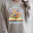 Women's New Chapter Begins Retired 2026 Watercolor Floral Book Women Raglan Sleeve Sweatshirt Heather Forest