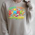 Women's Unearth a Story Summer 2026 Summer Reading Program Book Raglan Sleeve Sweatshirt Heather Forest
