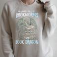 In A World Of Bookworms Be A Book Dragon Book Lover Reader Raglan Sleeve Sweatshirt Heather Forest In A World Of Bookworms Be A Book Dragon Book Lover Reader Raglan Sleeve Sweatshirt Heather Forest