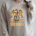 In A World Of Bookworms Be A Book Dragon Raglan Sleeve Sweatshirt Heather Forest