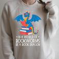In A World Full Of Bookworms Be A Book Dragon Reading Raglan Sleeve Sweatshirt Heather Forest In A World Full Of Bookworms Be A Book Dragon Reading Raglan Sleeve Sweatshirt Heather Forest