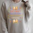 They Didn't Ban Books They Banned Thinking Raglan Sleeve Sweatshirt Heather Forest