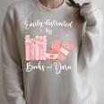 Yarn Quote Easily Distracted By Books And Yarn Reader Premium Tri-Blend Raglan Sleeve Sweatshirt Heather Forest