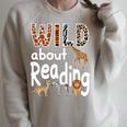 Zoo Animals Wild About Reading Books Reader Lover Librarian Premium Tri-Blend Raglan Sleeve Sweatshirt Heather Forest