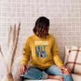 Football Skeleton Reading On Book Stack Raglan Sleeve Sweatshirt Ash