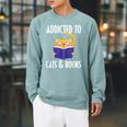 Addicted To Cats And Books Orange Tabby Cat Men Women Kids Raglan Sleeve Sweatshirt Cardinal