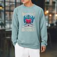 Bookworm Flying Mythical Creature Book Reading Dragon Raglan Sleeve Sweatshirt Cardinal
