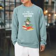 The Bookworm Gnome Christmas Gnome Book Reading Enthusiast Raglan Sleeve Sweatshirt Cardinal