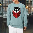 Cat Reads Book How To Live With Humans Raglan Sleeve Sweatshirt Cardinal