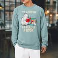 Cute Capybara It's a Good Day To Read a Book World Book Day Raglan Sleeve Sweatshirt Cardinal
