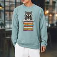 Cute Raccoon Reading On Pile Of Books Raglan Sleeve Sweatshirt Cardinal