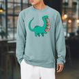 Dinosaur Carrying Book Reading Bookworm Librarian Raglan Sleeve Sweatshirt Cardinal