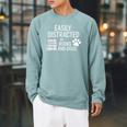 Dog Lovers Easily Distracted By Books And Dogs Bookworm Raglan Sleeve Sweatshirt Cardinal