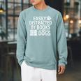 Easily Distracted By Books And Dogs Dog Parent Bibliophile Raglan Sleeve Sweatshirt Cardinal