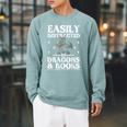 Easily Distracted By Dragons And Books Fantasy Book Lover Raglan Sleeve Sweatshirt Cardinal